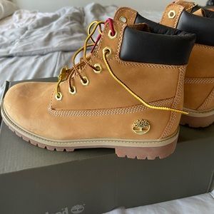 Brand new Timberland Construction boots. Never worn. Still in the box.